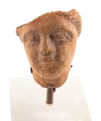 A Roman Stone Head of a Woman