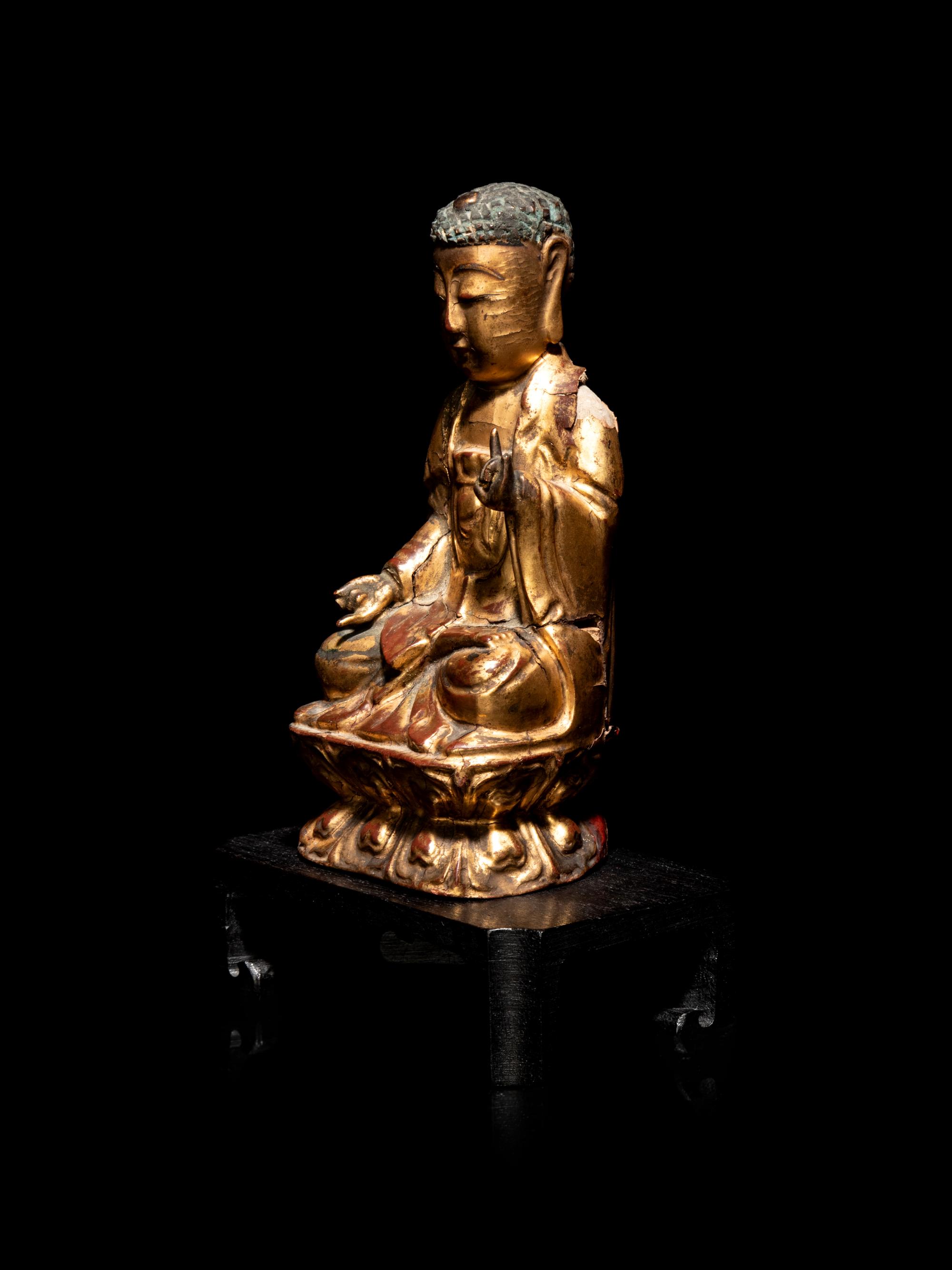 A Small Chinese Gilt Lacquered Wood Figure of Buddha Shakyamuni