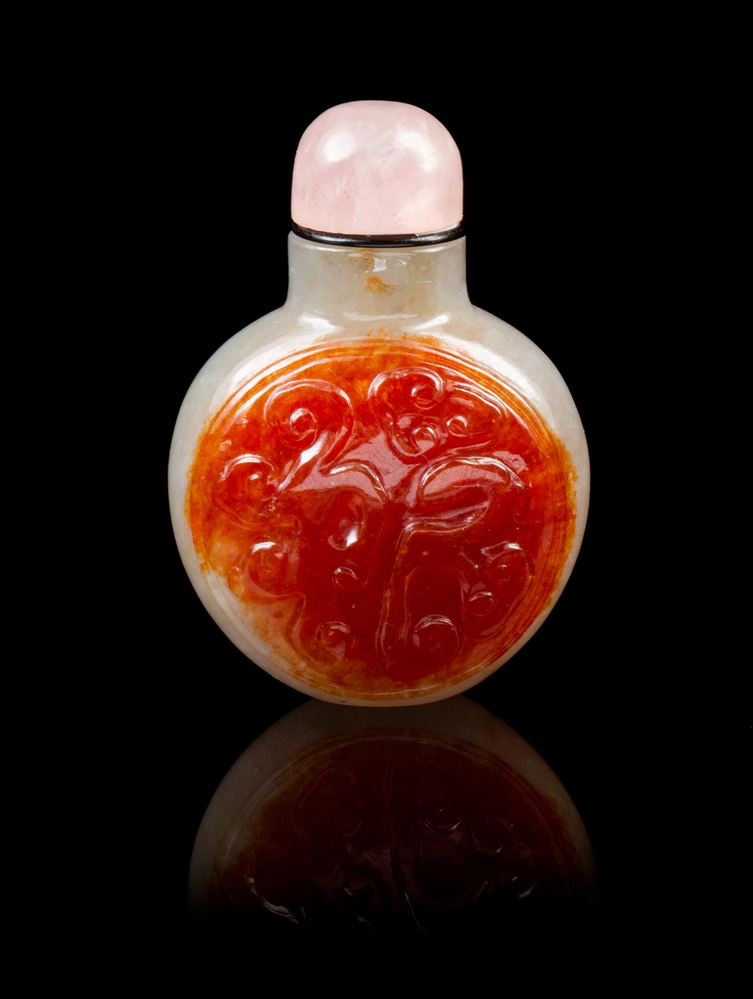A Chinese Jadeite Snuff Bottle 19TH CENTURY Height 2 1/4 inches. — 19TH CENTURY
