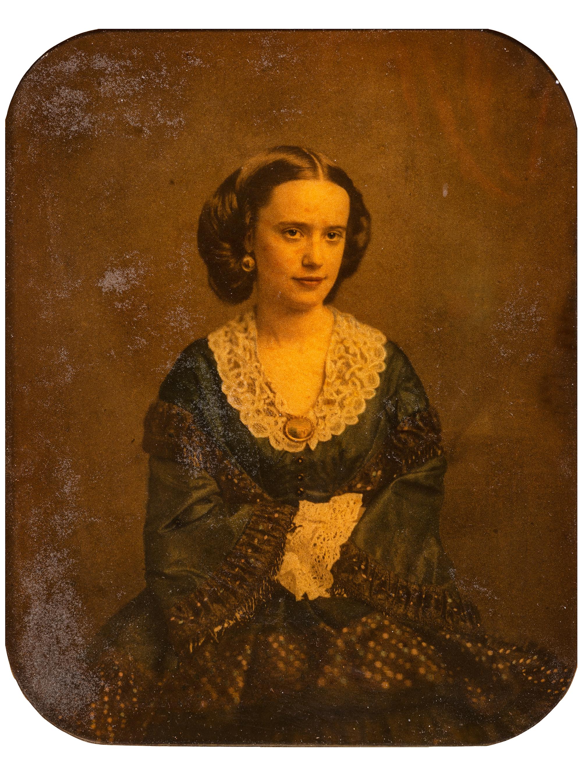 [EARLY PHOTOGRAPHY]. Large ivorytype portrait of a beautiful woman wearing a cameo.