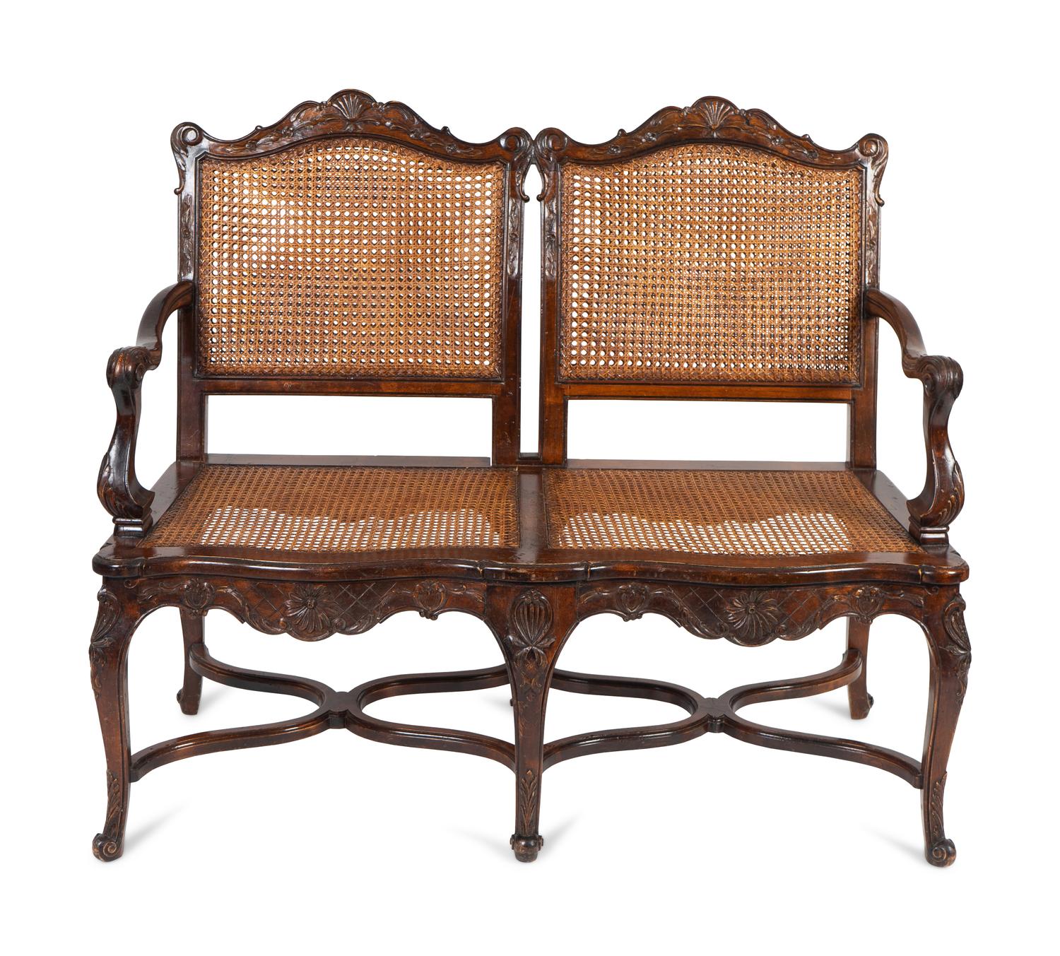A Louis XV Style Caned Settee — 20TH CENTURY