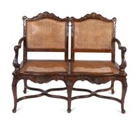 A Louis XV Style Caned Settee — 20TH CENTURY