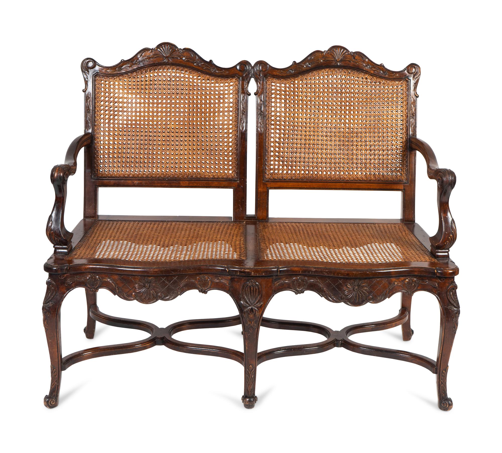 A Louis XV Style Caned Settee — 20TH CENTURY