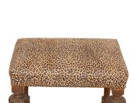 A Louis XIV Carved Walnut Tabouret with Leopard Print Upholstery