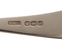 An English Silver Cranberry Spoon, Sauce Ladle and Slotted Ladle