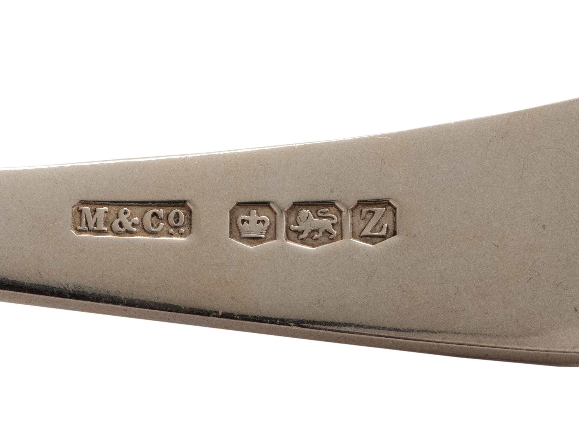 An English Silver Cranberry Spoon, Sauce Ladle and Slotted Ladle