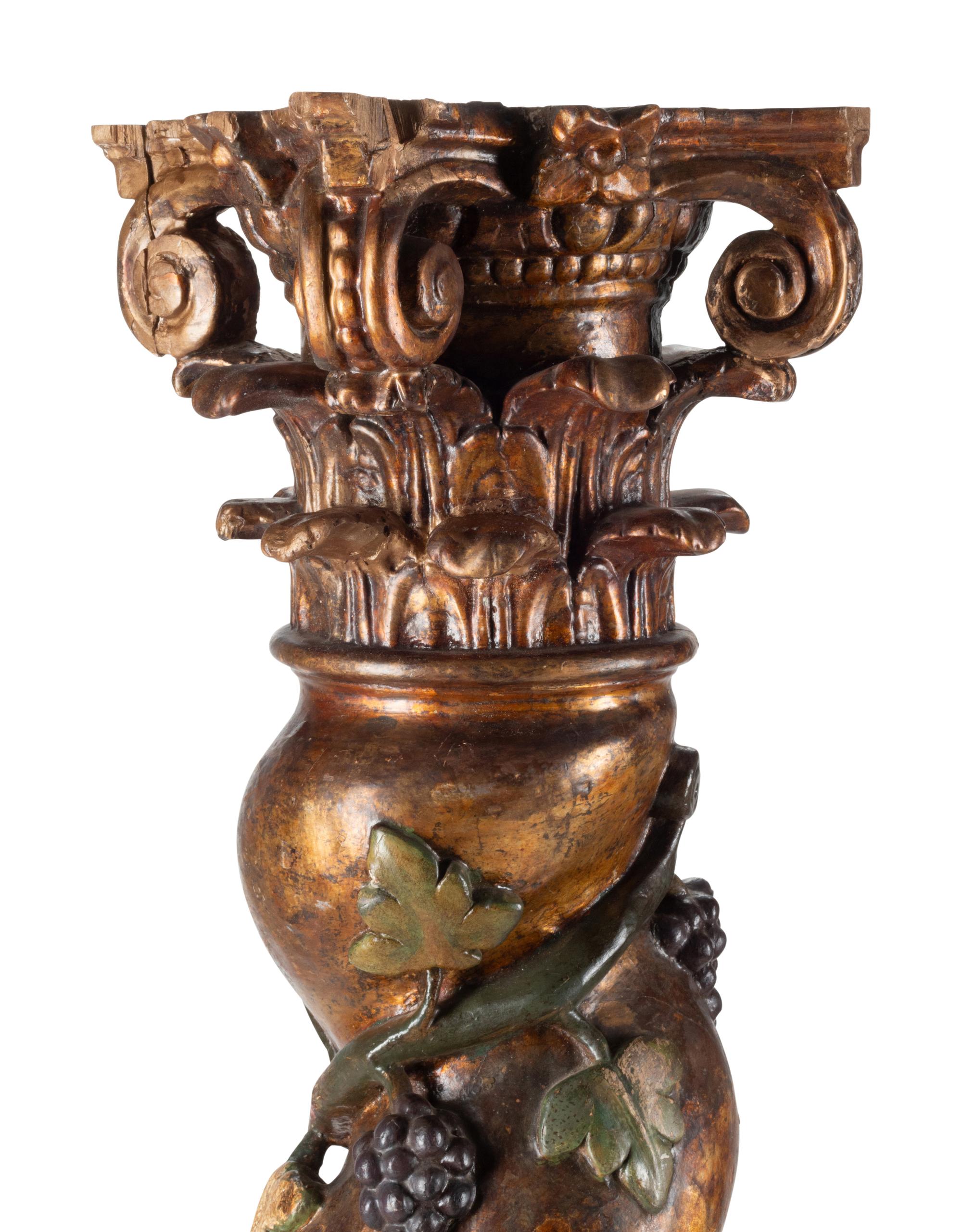 A Pair of Spanish Carved and Polychrome Decorated Solomonic Columns