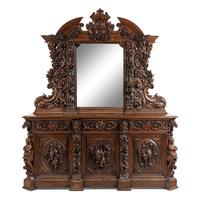 A French Carved Walnut Buffet à Deux Corps