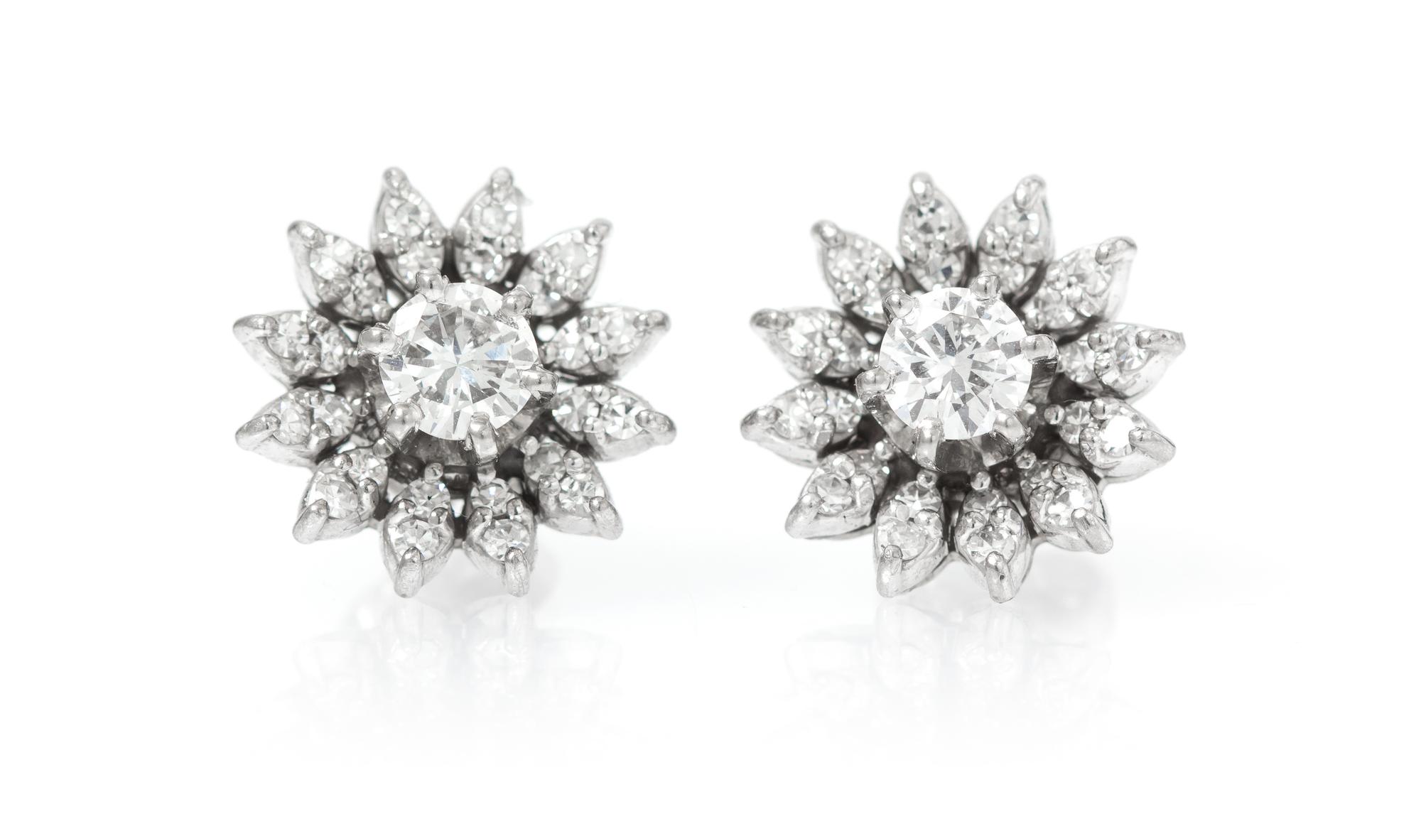 A Pair of White Gold and Diamond Floral Earrings, 3.60 dwts.