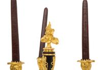 A Pair of Empire Style Gilt and Patinated Bronze Three-Light Candelabra