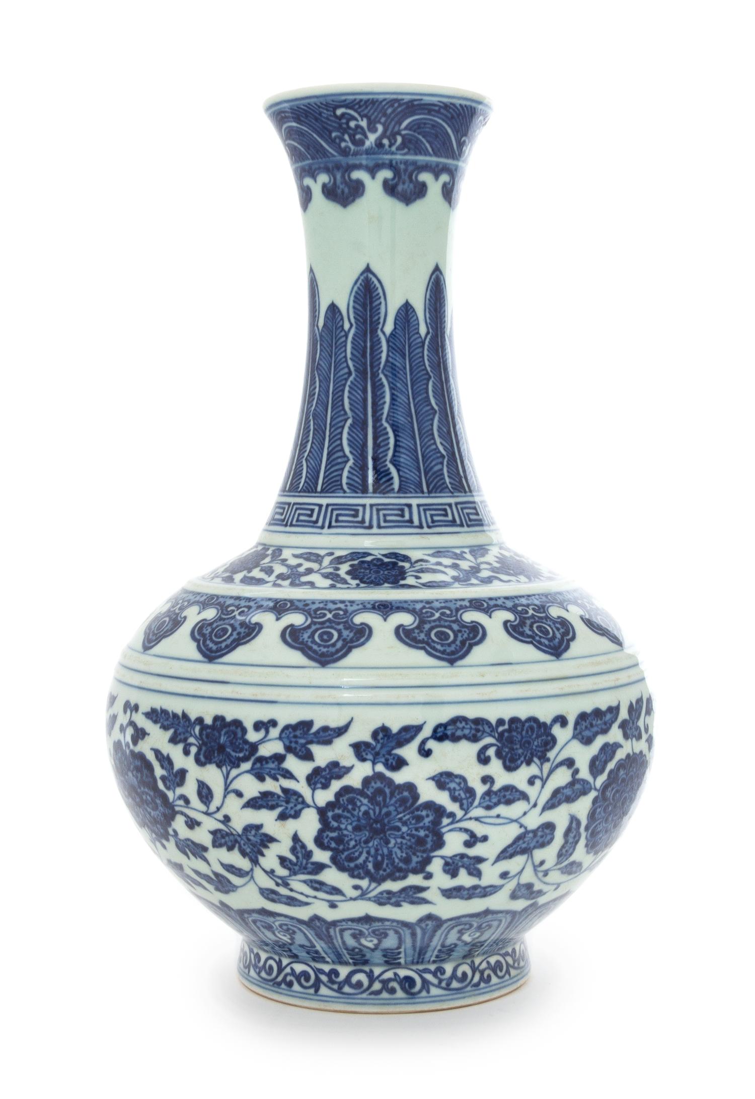 A Blue and White Porcelain Bottle Vase, Shangping Height 14 1/2 inches.
