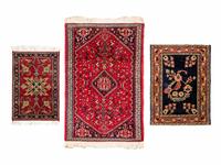 A Group of Persian and Persian Style Wool Mats