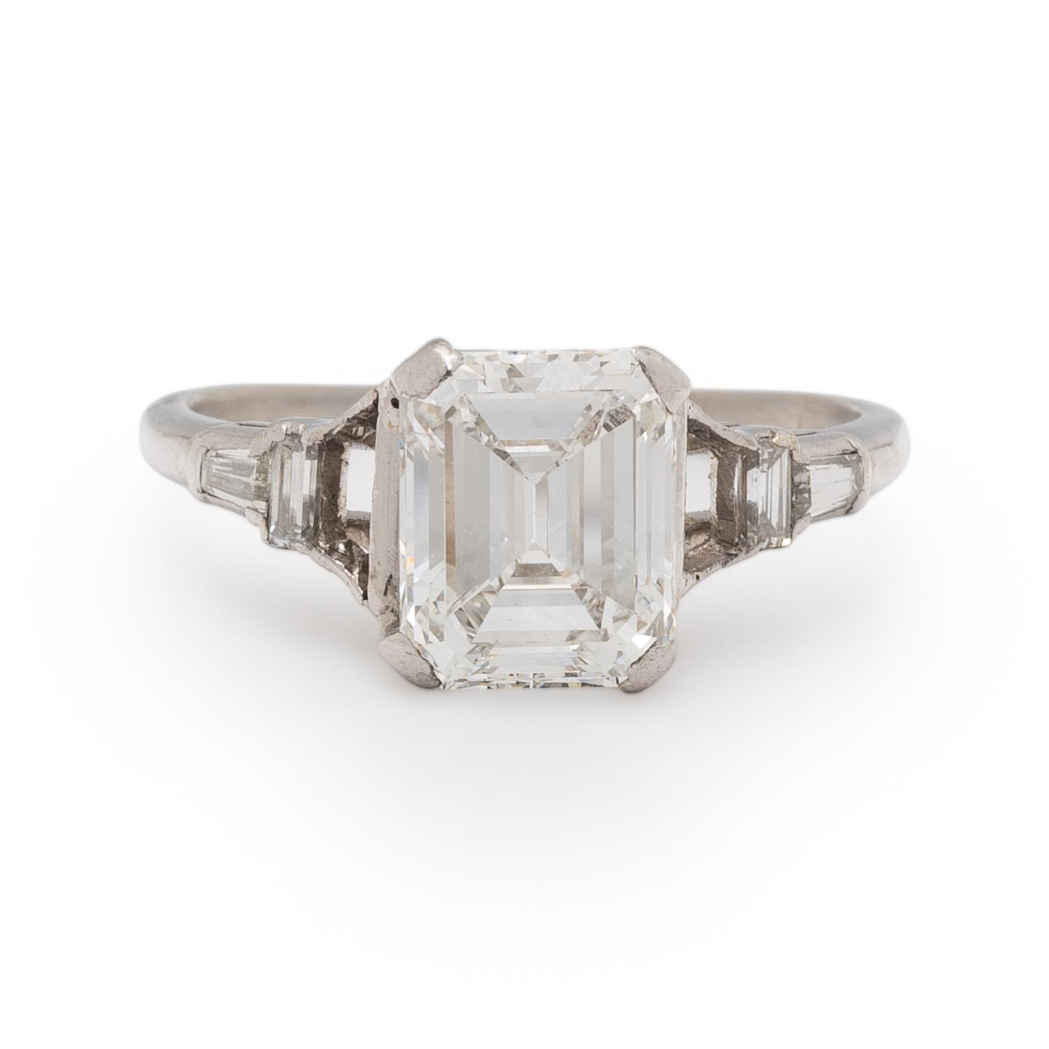 EMERALD CUT DIAMOND AND PLATINUM RING
