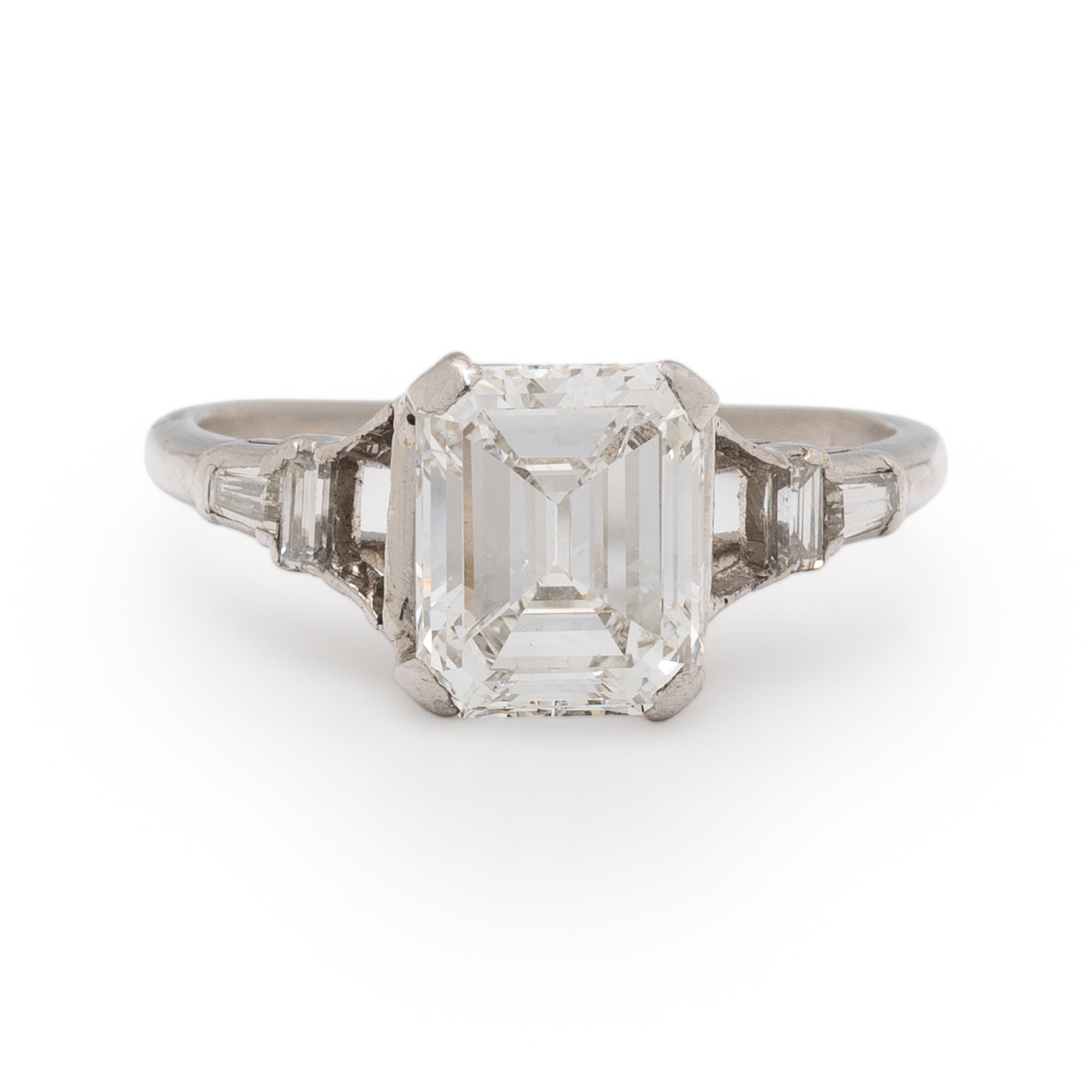 EMERALD CUT DIAMOND AND PLATINUM RING