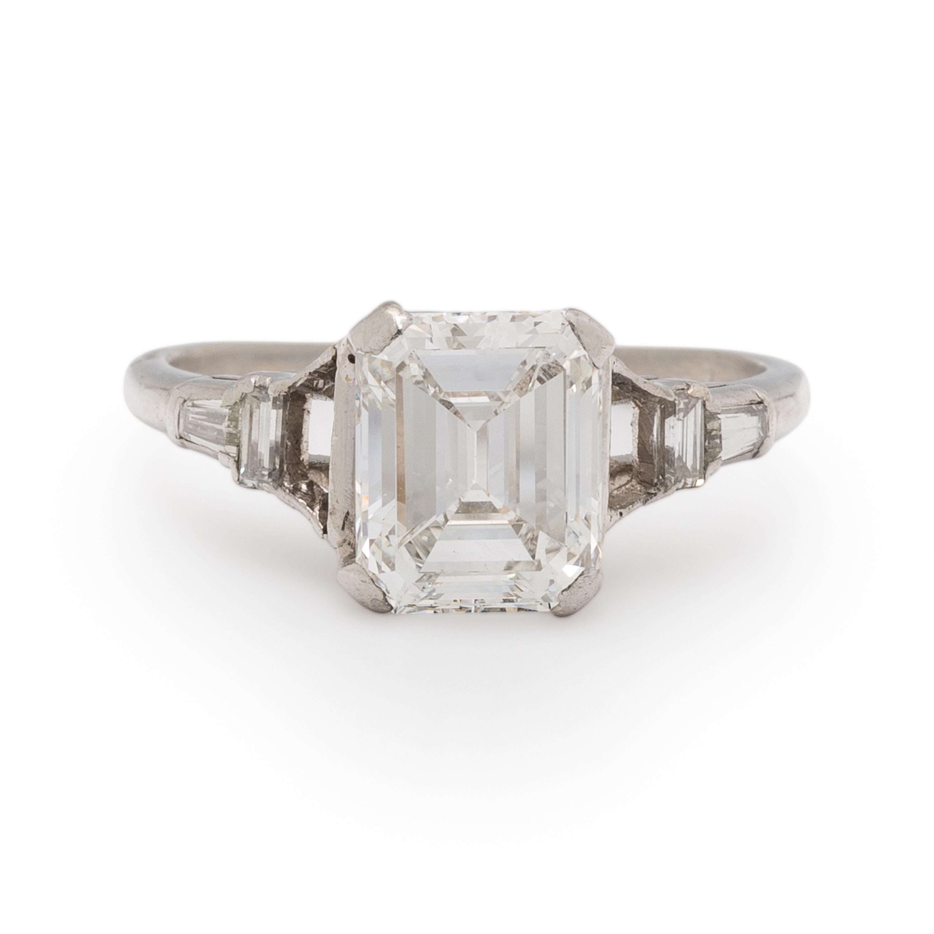 EMERALD CUT DIAMOND AND PLATINUM RING