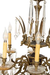 A Continental Gilt Metal and Cut Glass Eight-Light Chandelier