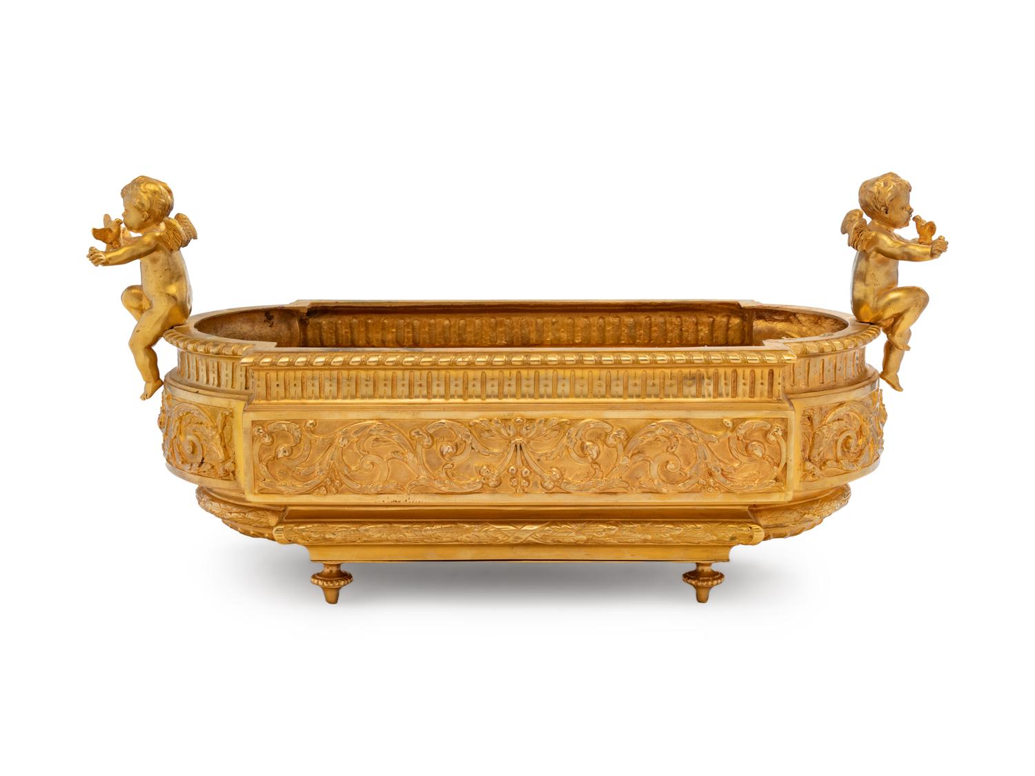 A Neoclassical Gilt Bronze Figural Jardinière