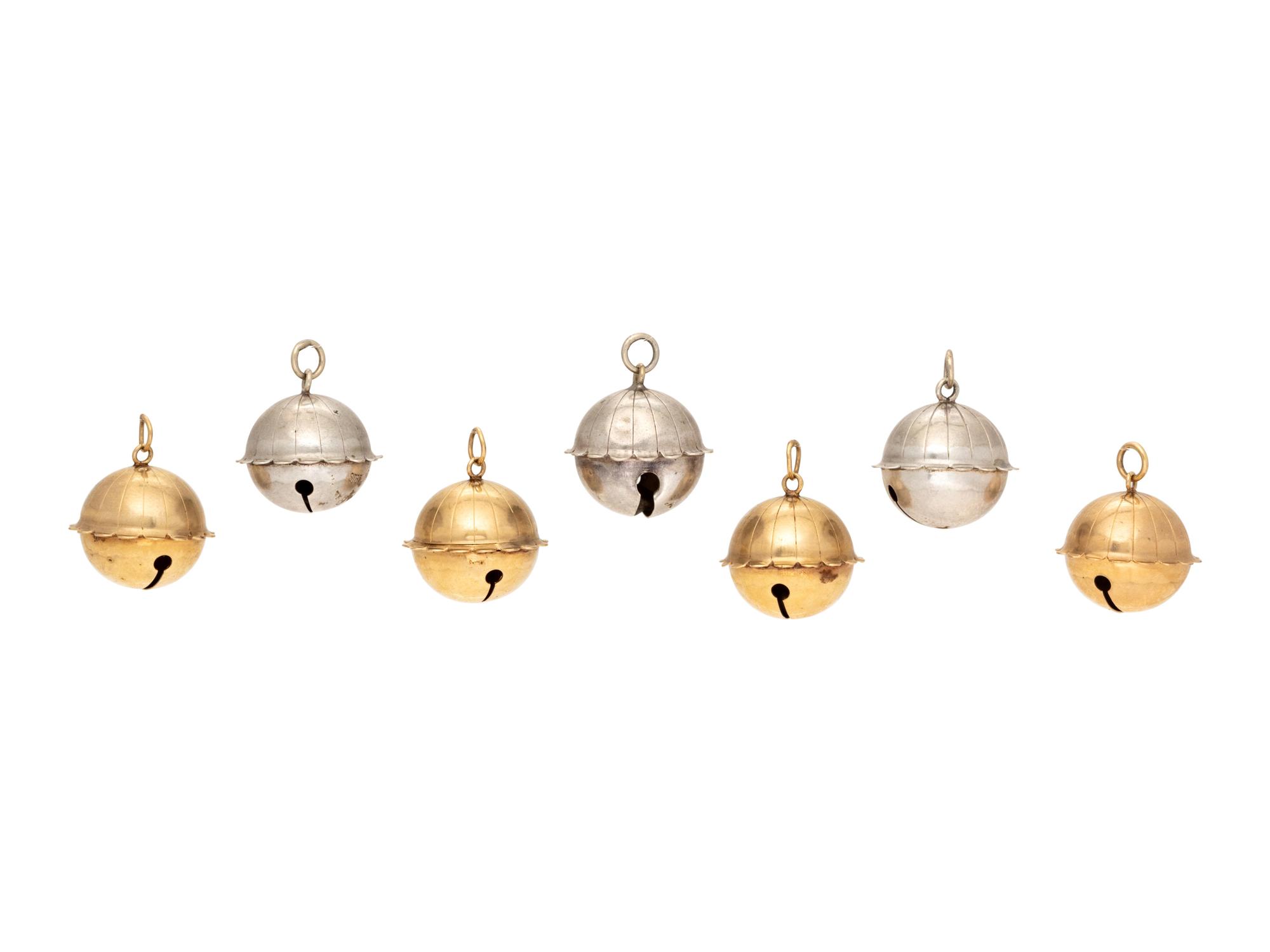 A Collection of 14 Karat Yellow Gold and Sterling Silver Jingle Bells,