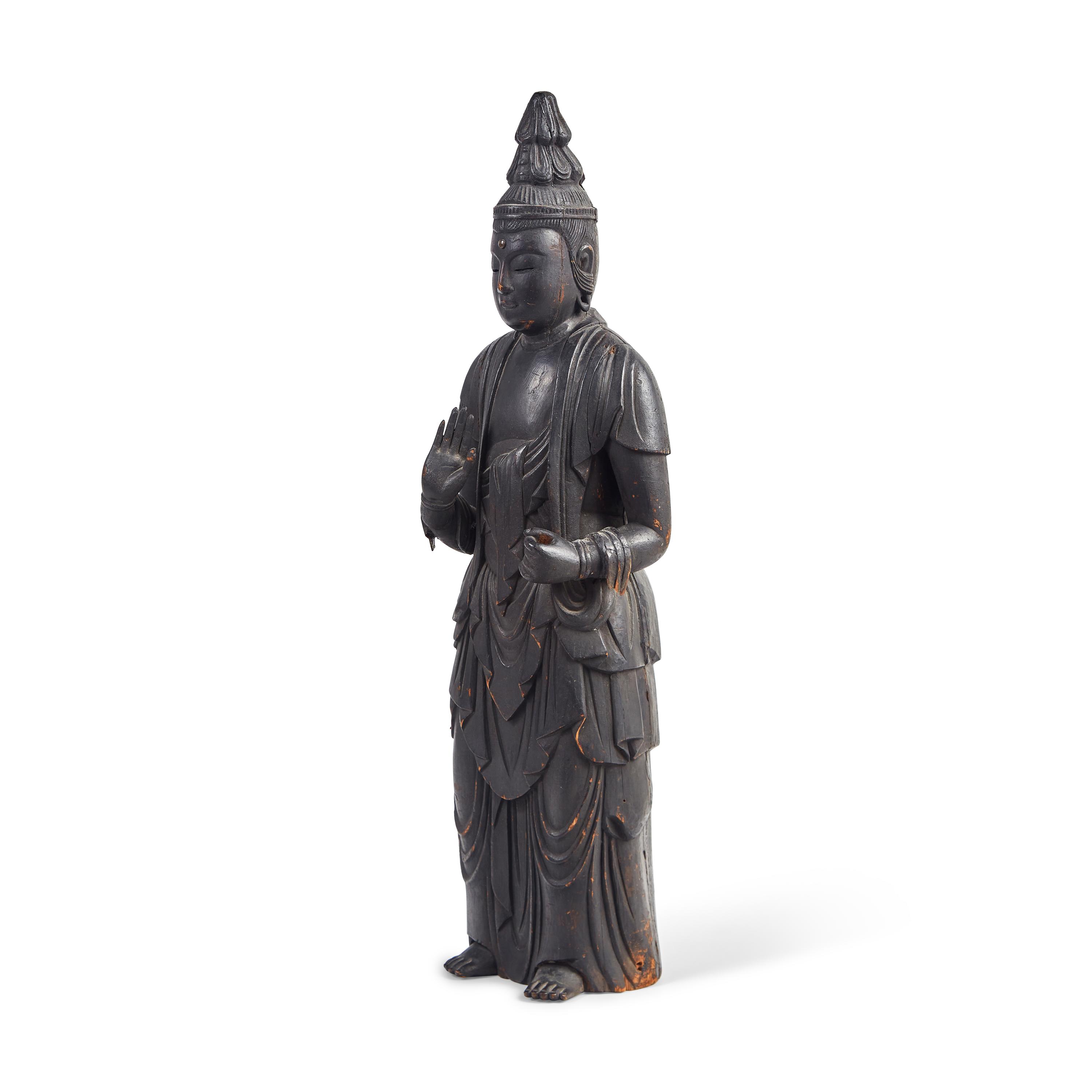 A Large Japanese Carved and Stained Wood Standing Figure of Kannon Bosatsu , Heian Period, 11th/12th Century