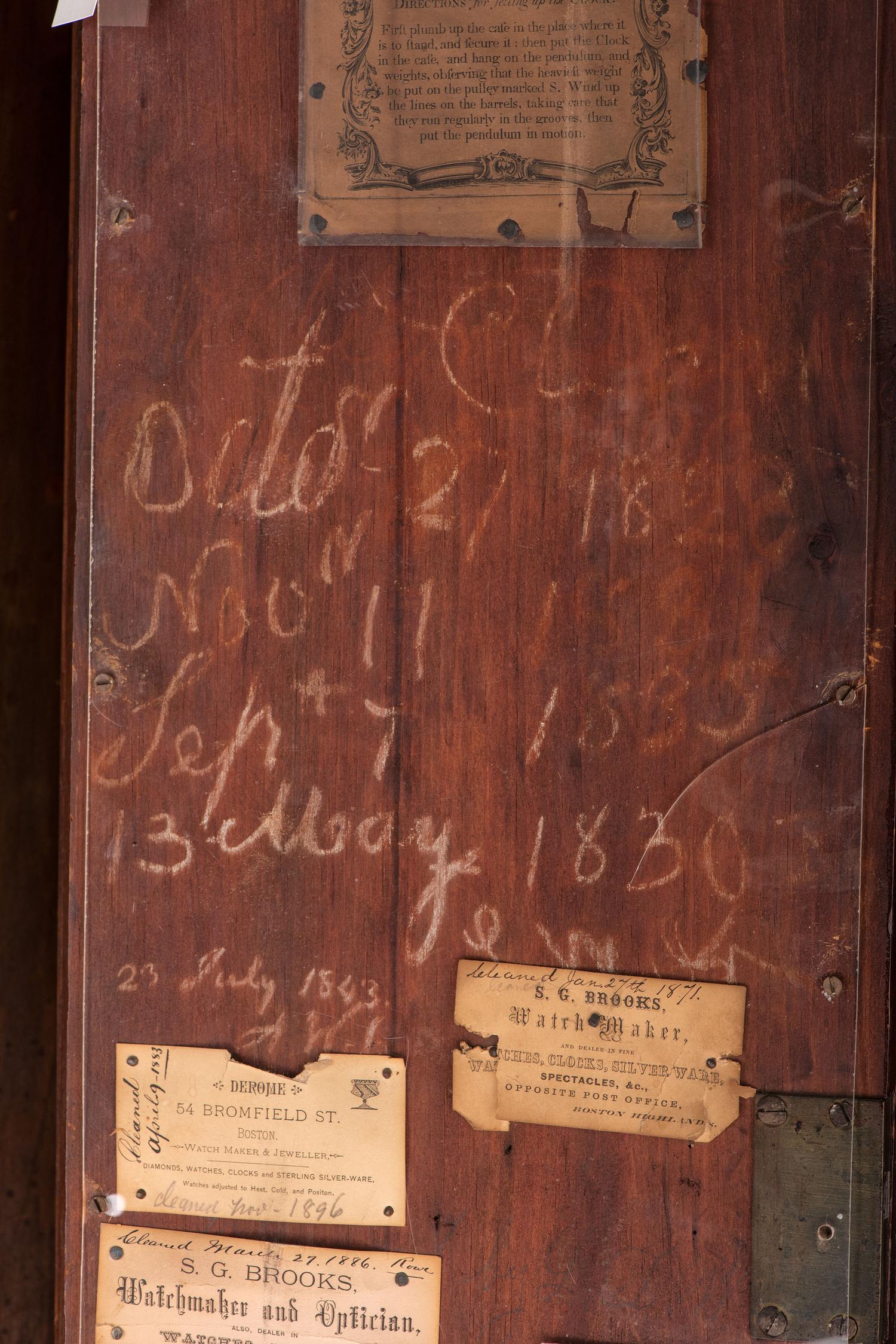 A Federal Carved, Inlaid and Figured Mahogany Tall Case Clock