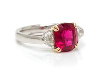 A Platinum, 18 Karat Yellow Gold, Ruby and Diamond Ring, 5.00 dwts.