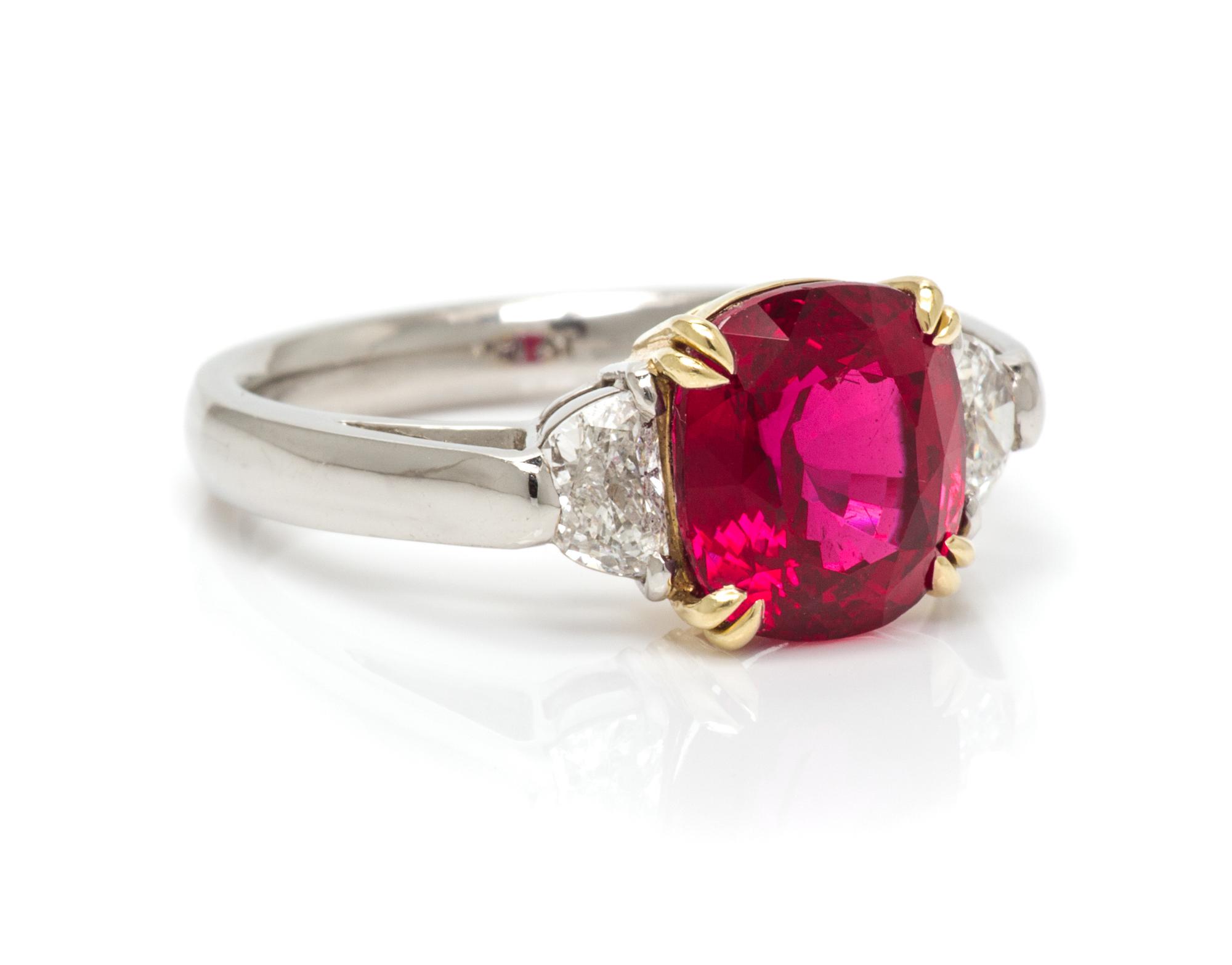 A Platinum, 18 Karat Yellow Gold, Ruby and Diamond Ring, 5.00 dwts.