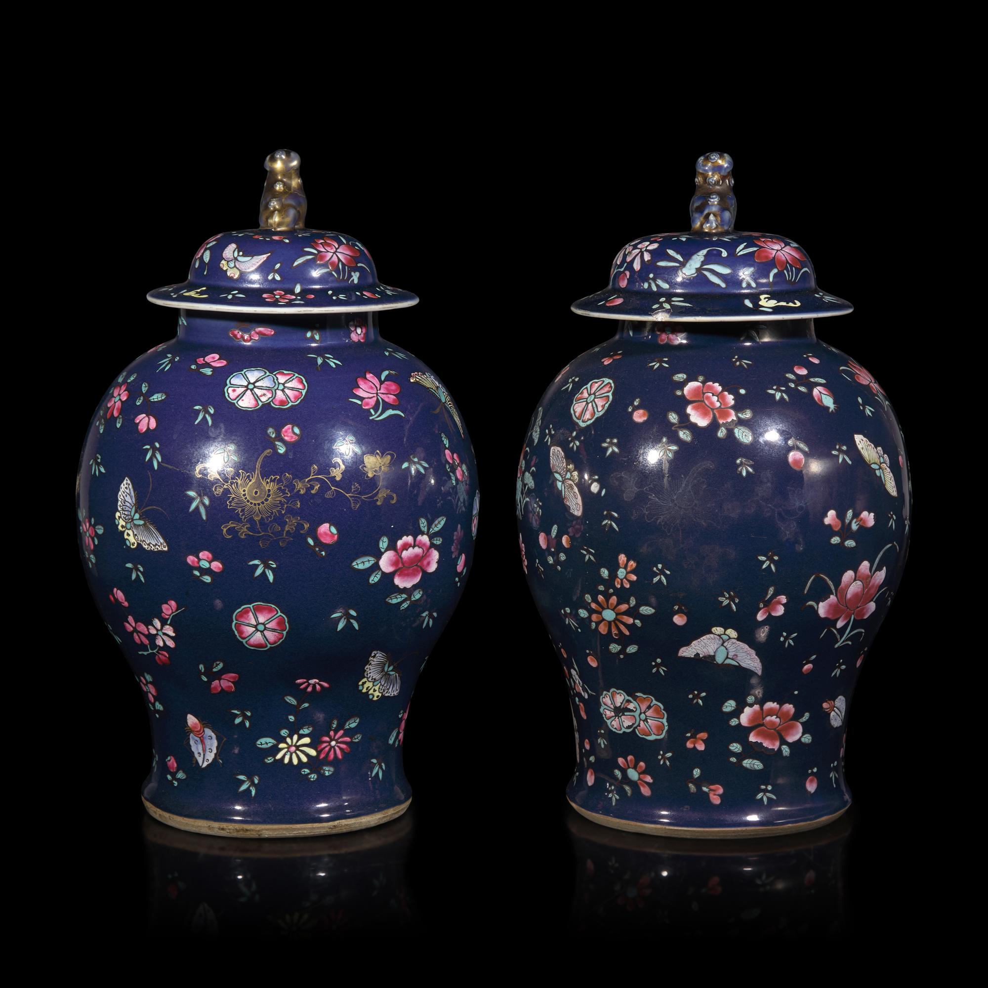 A Pair of Chinese Enameled Blue-Ground Porcelain Jars and Covers, First Half 19th Century — 清中期 藍地粉彩蝶戀花紋將軍罐一對
