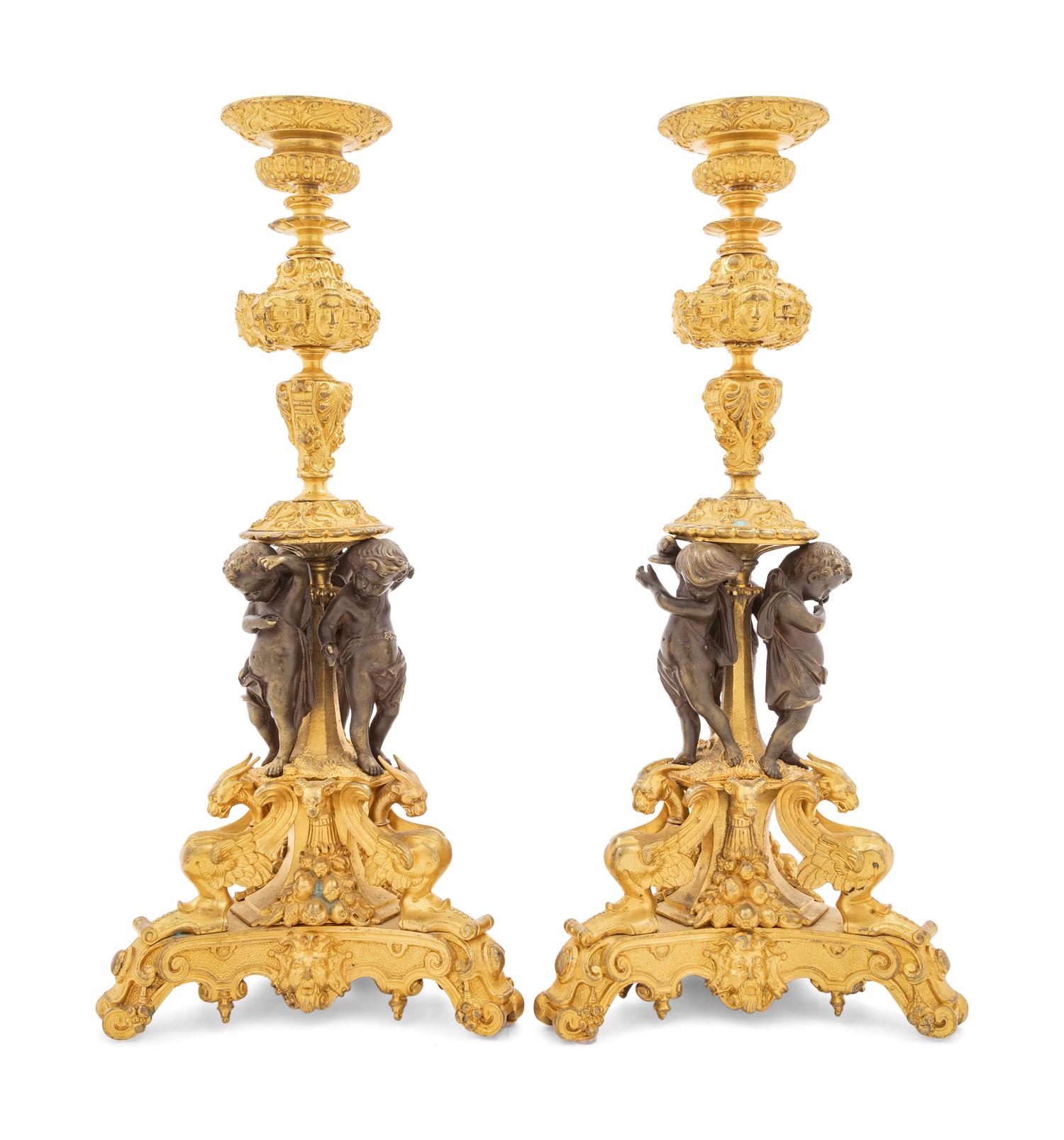 A Pair of French Bronze Candlesticks