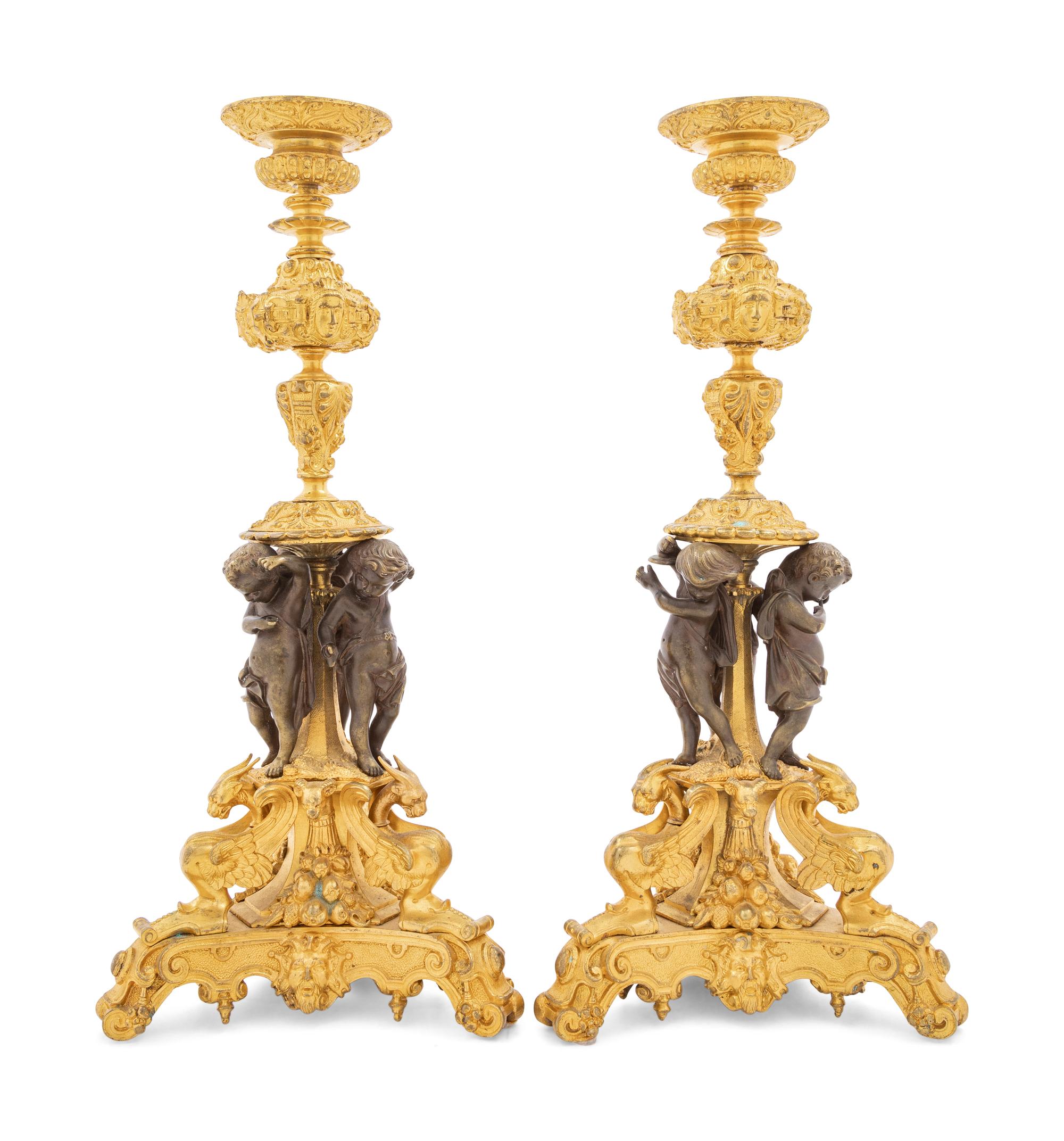 A Pair of French Bronze Candlesticks