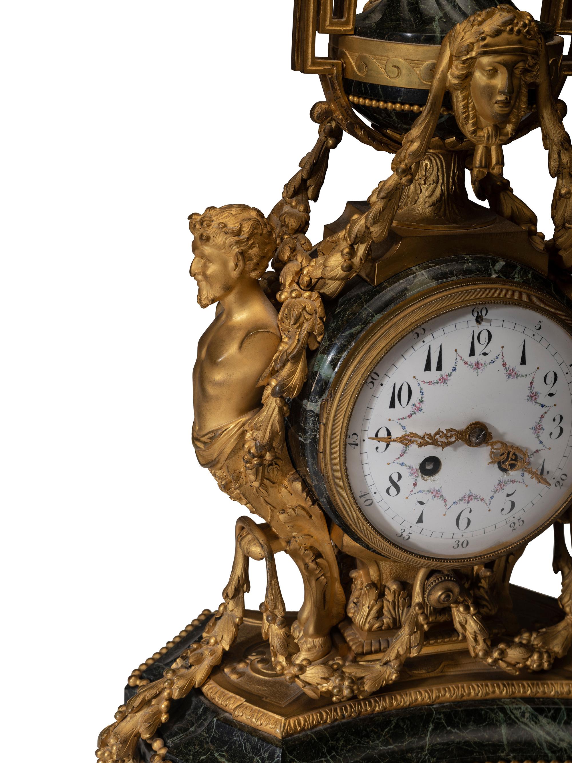 A Napoleon III Gilt Bronze and Marble Clock