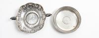 A Pair of Continental Silver Dishes, , comprising a twin-handled Austrian example with a scalloped body, the base with an inset 1780 Au