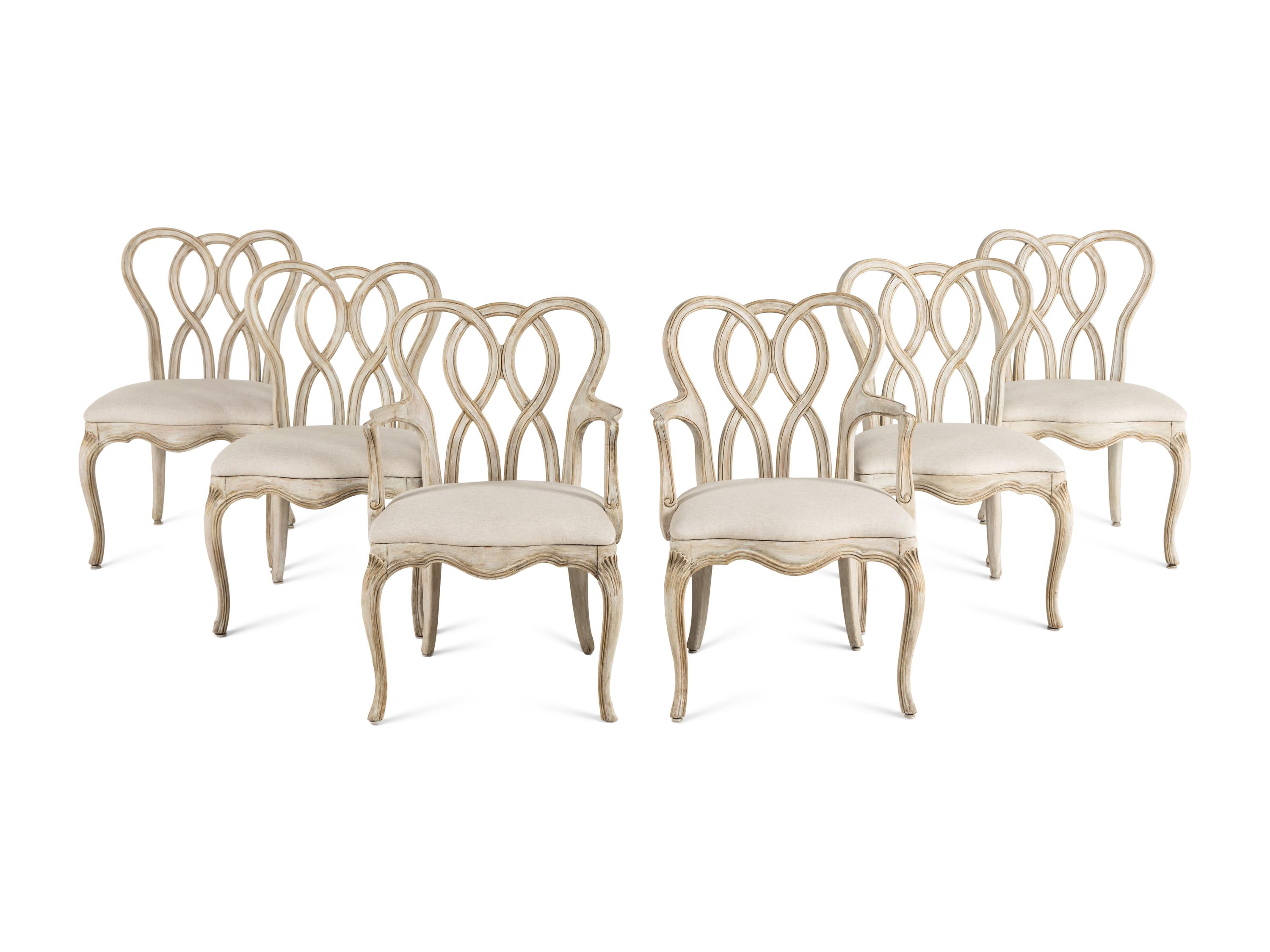 A Dennis and Leen Painted and Parcel-Gilt Dining Suite