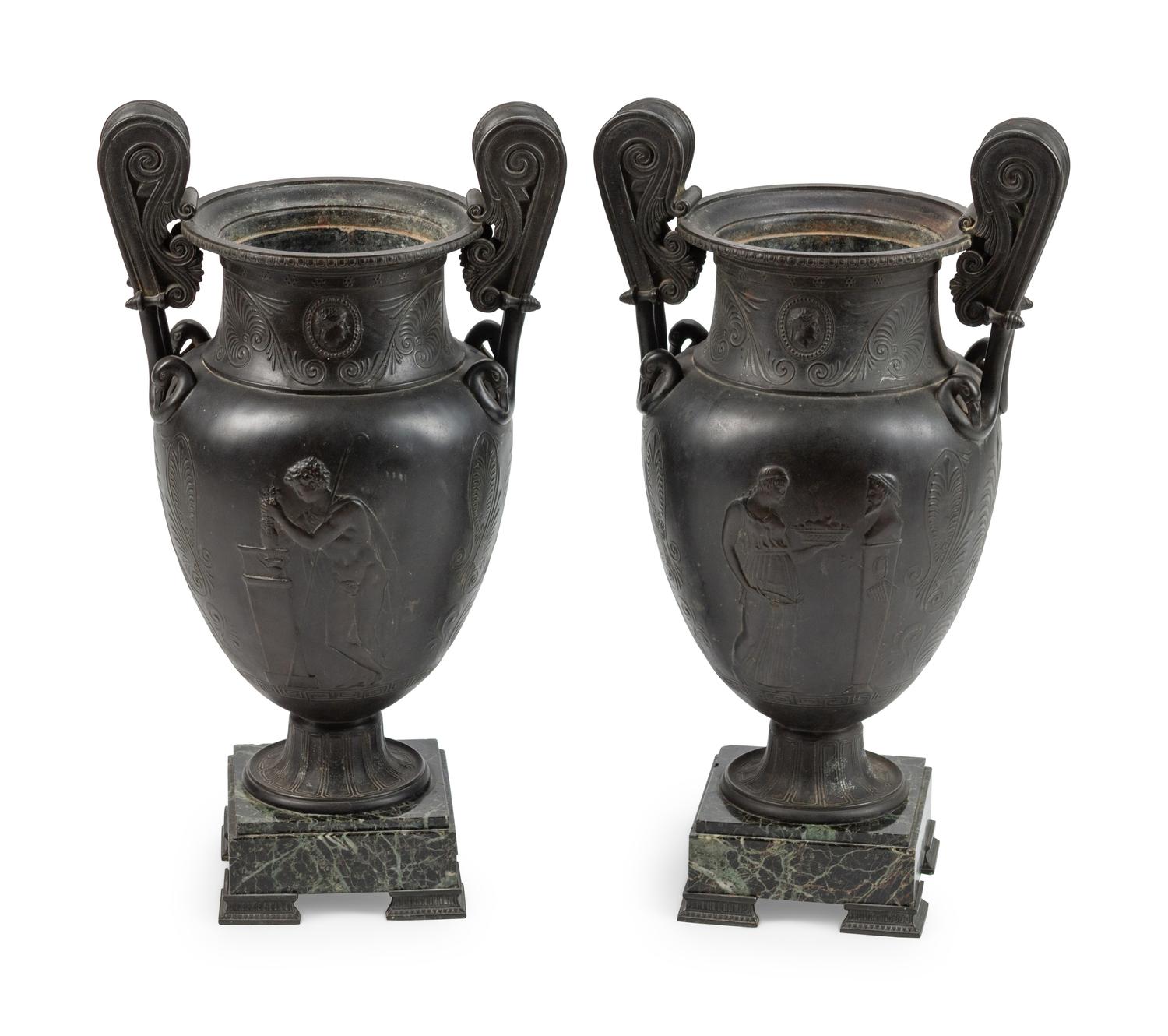 A Pair of Grand Tour Patinated Metal Urns on Marble Bases