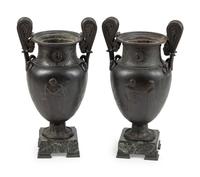 A Pair of Grand Tour Patinated Metal Urns on Marble Bases