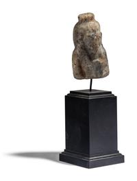 An Egyptian Stone Bust of Hathor