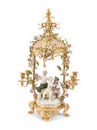 A Pair of French Gilt Bronze and Porcelain Figural Four-Light Candelabra