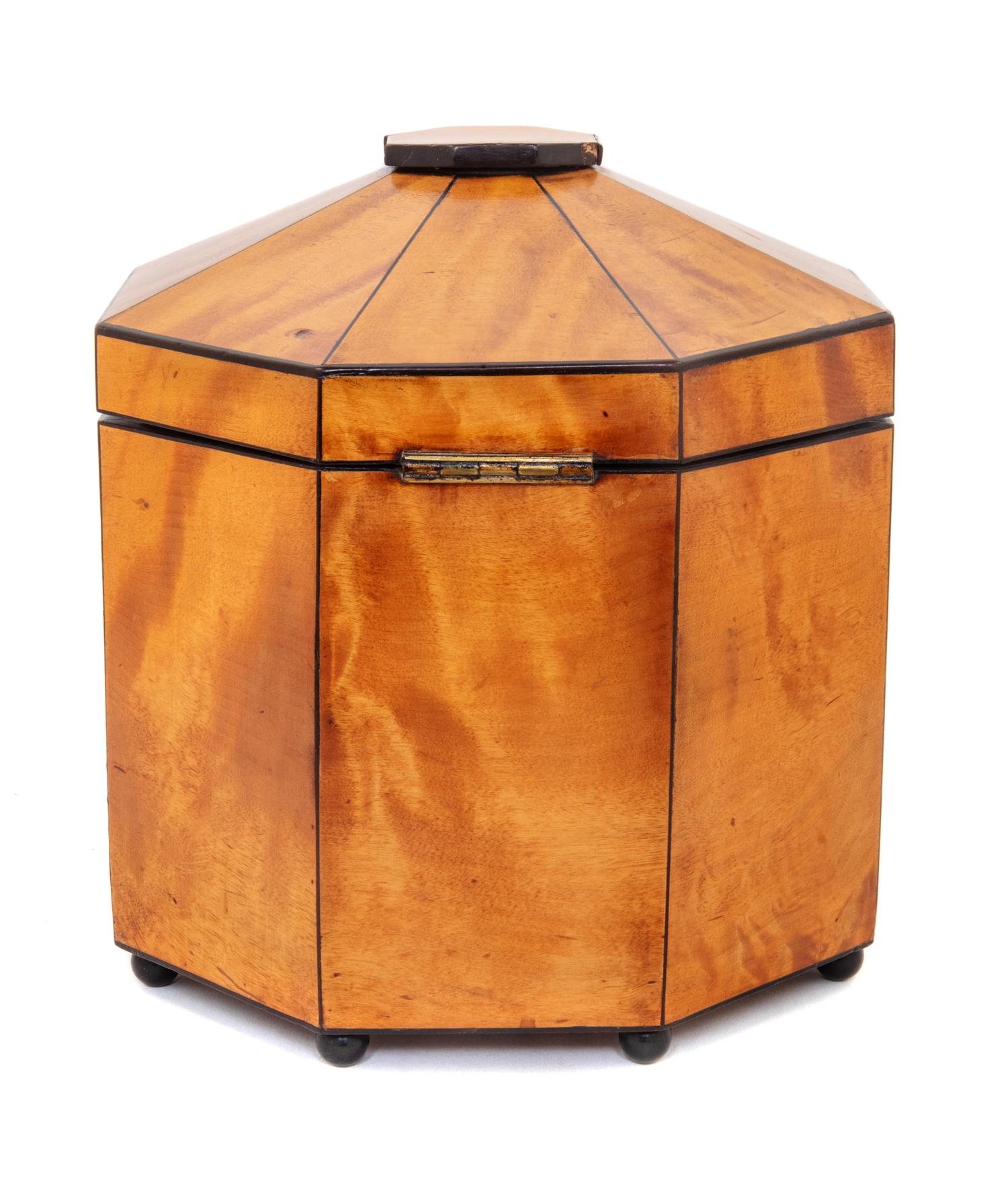 A Biedermeier Ebony Banded Satinwood Octagonal Tea Caddy