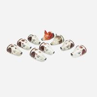 A Group of Nine English Pearlware Fox and Hound Stirrup Cups 19th/ early 20th century