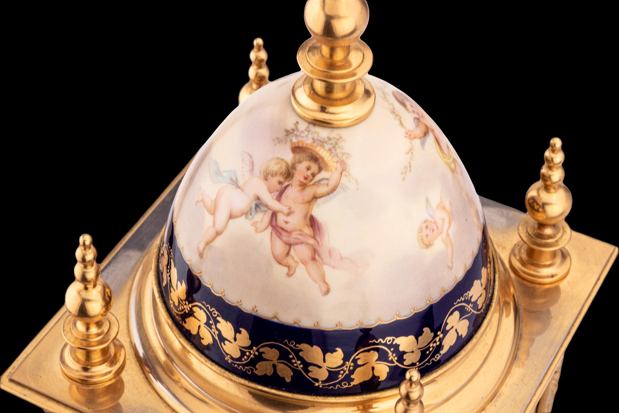 A Royal Vienna Porcelain Mounted Gilt Bronze Clock, Couaillet