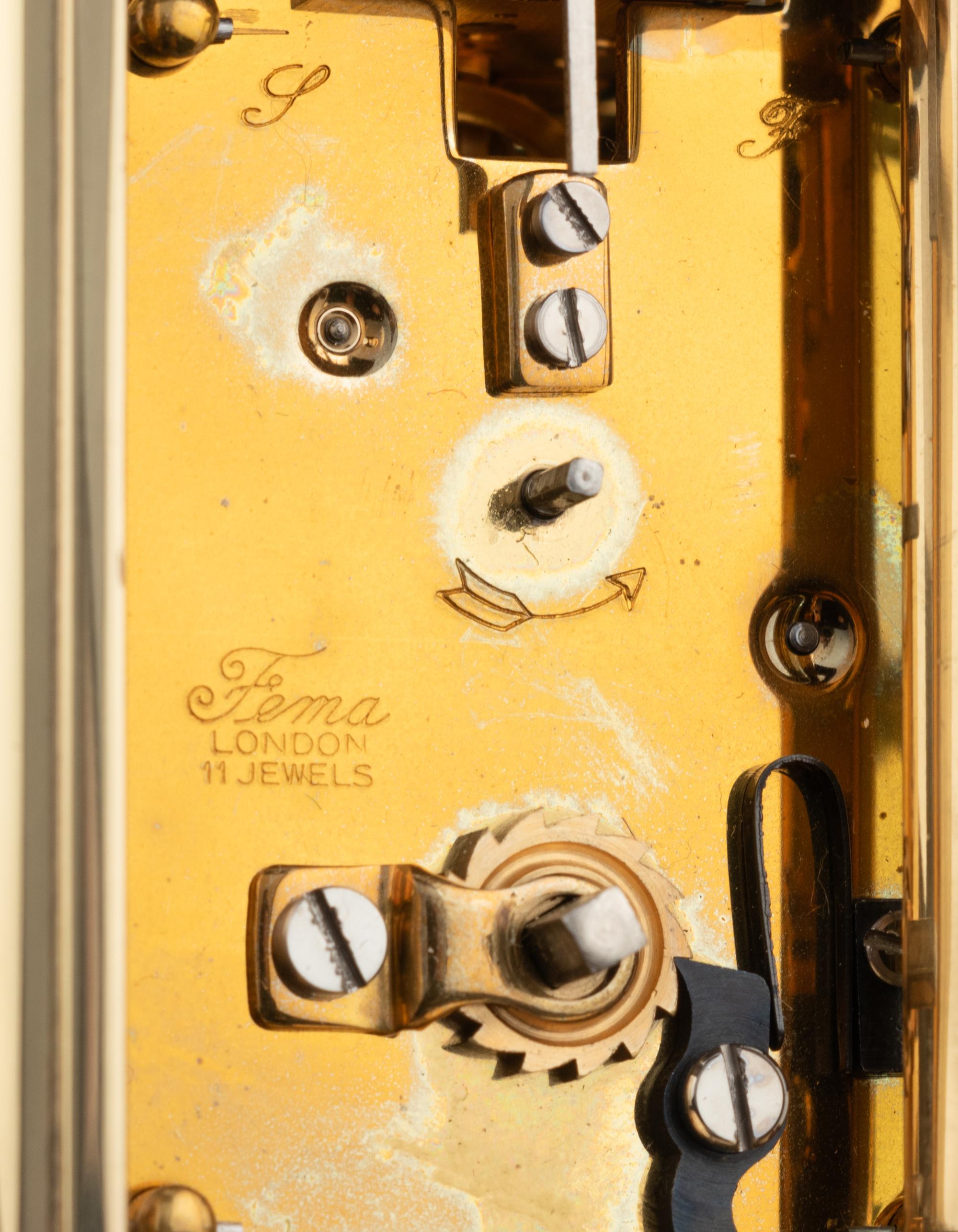 An Asprey and Co. Malachite and Brass Carriage Clock