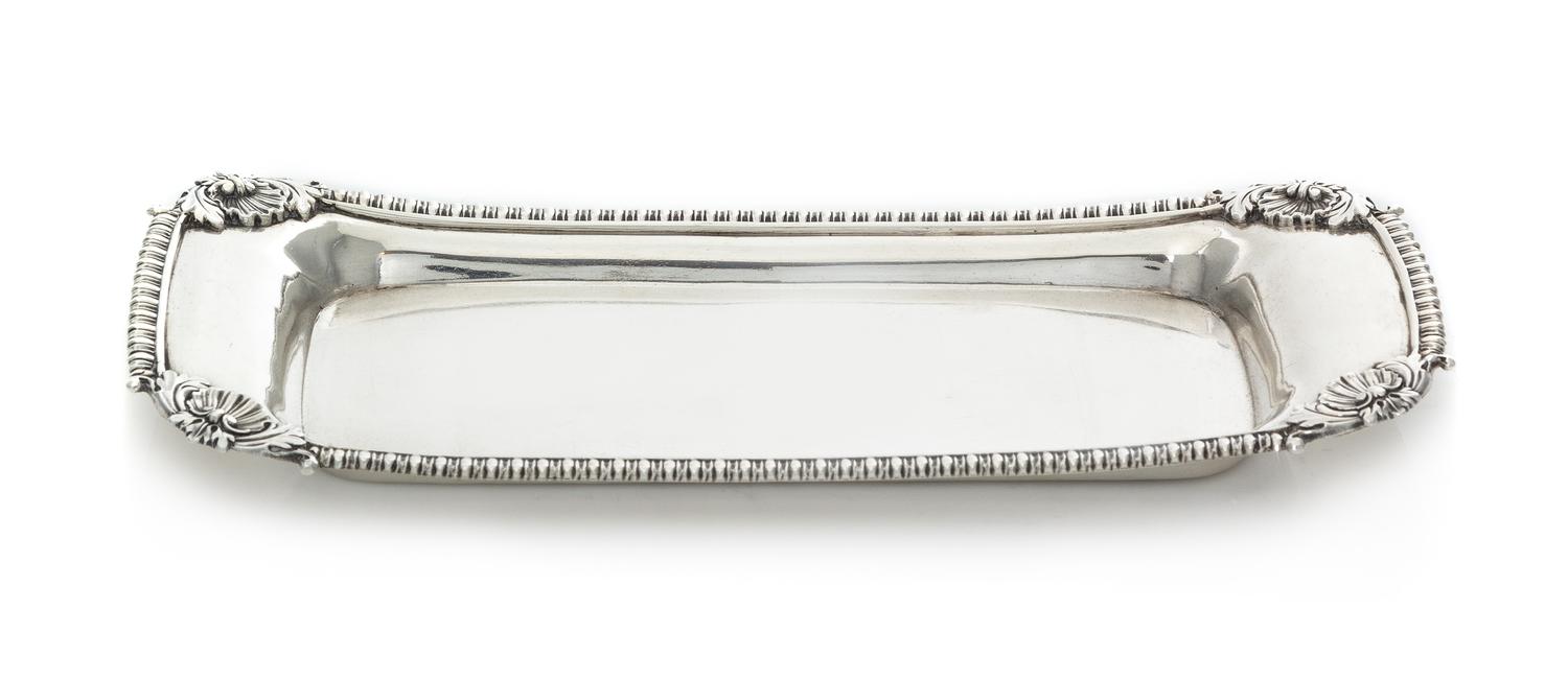 A George III Silver Bread Tray, Rebecca Emes & Edward Barnard I, London, 1810, of rectangular form with a gadroon rim, the corners work