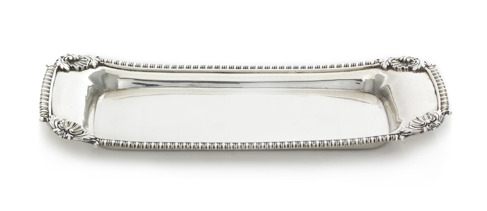A George III Silver Bread Tray, Rebecca Emes & Edward Barnard I, London, 1810, of rectangular form with a gadroon rim, the corners work