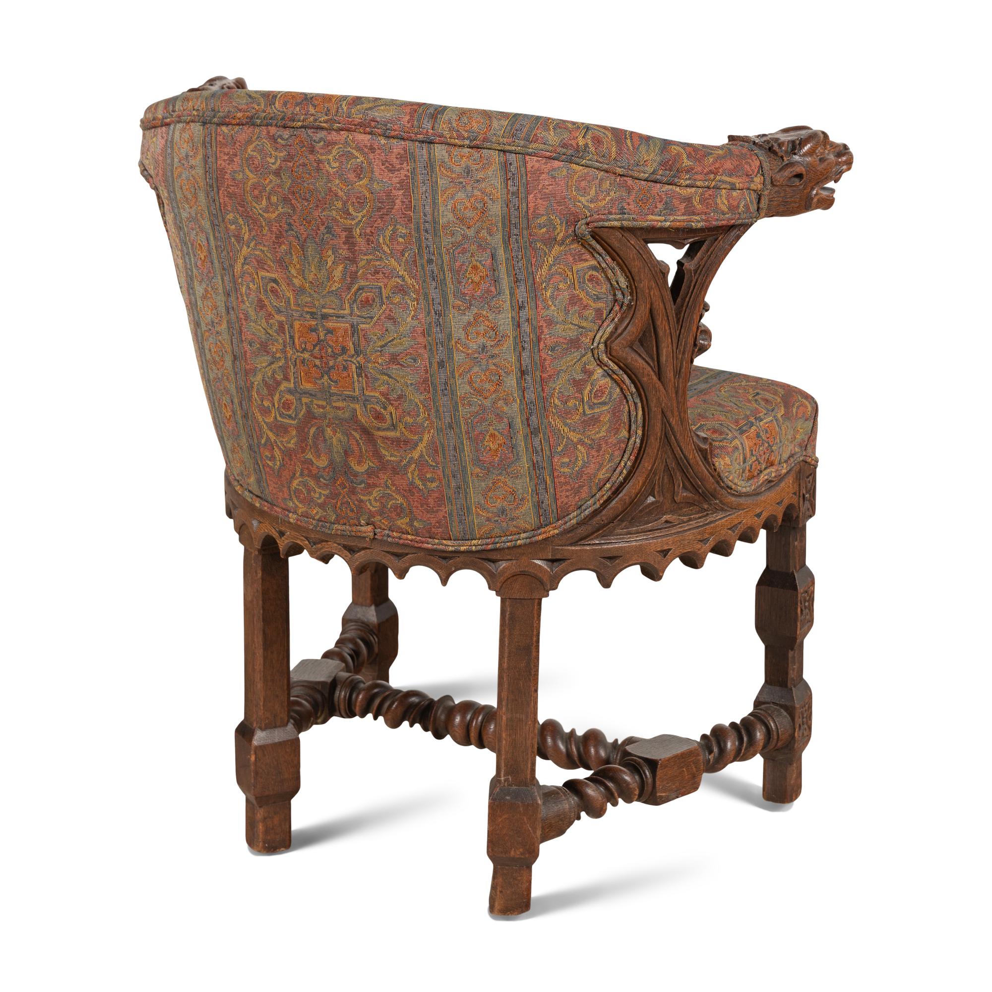 A French or Italian Gothic Revival Carved Oak Armchair