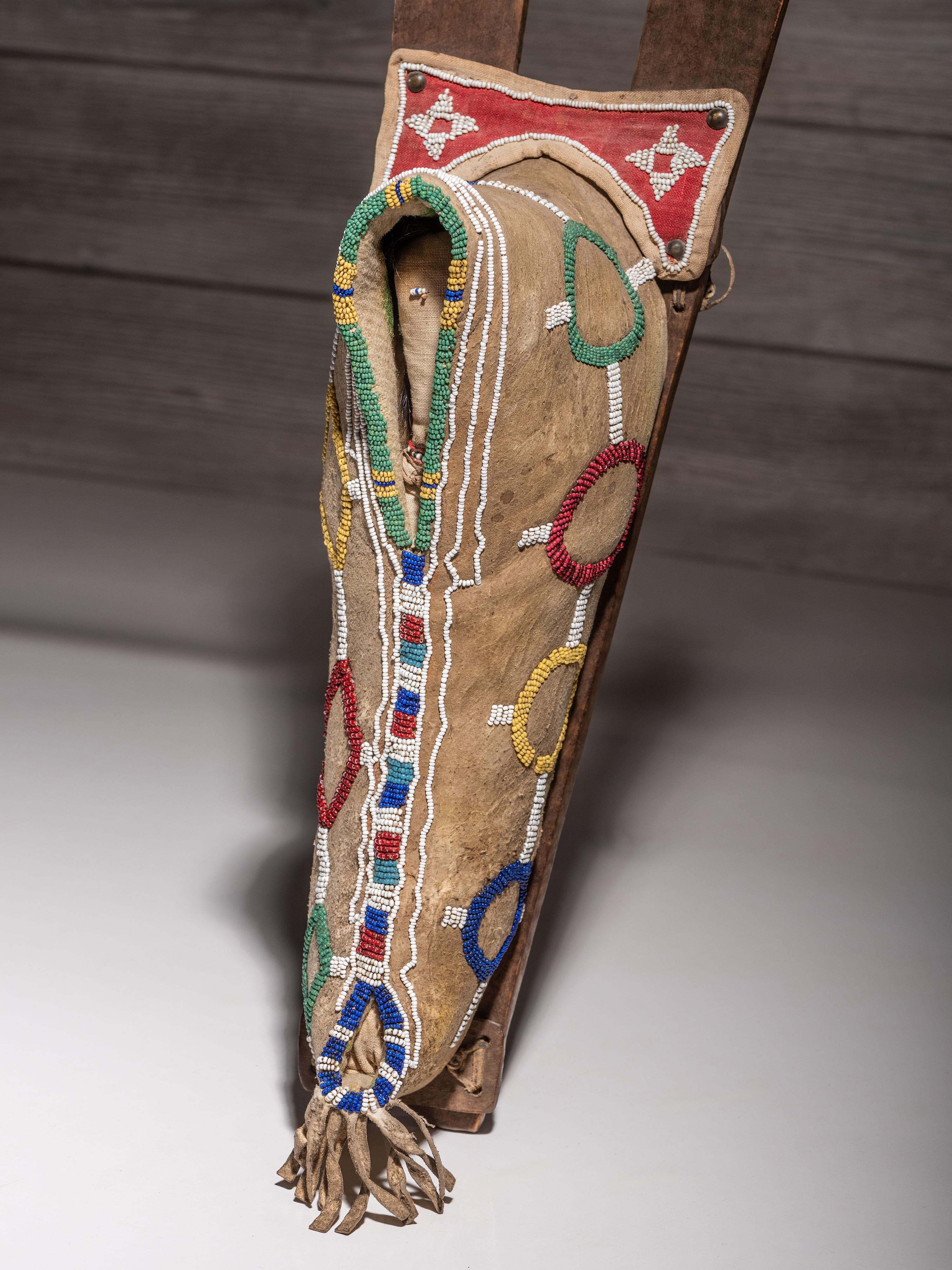 Kiowa Beaded Hide Doll Cradle, with Doll
