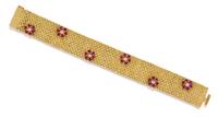 An 18 Karat Yellow Gold, Ruby and Diamond Bracelet, British, Circa 1969, 46.80 dwts.