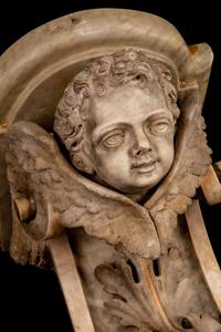 A Pair of Italian Amorini-Carved Marble Brackets — 18TH/19TH CENTURY
