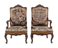 A Pair Louis XV Style Carved Walnut Fauteuils