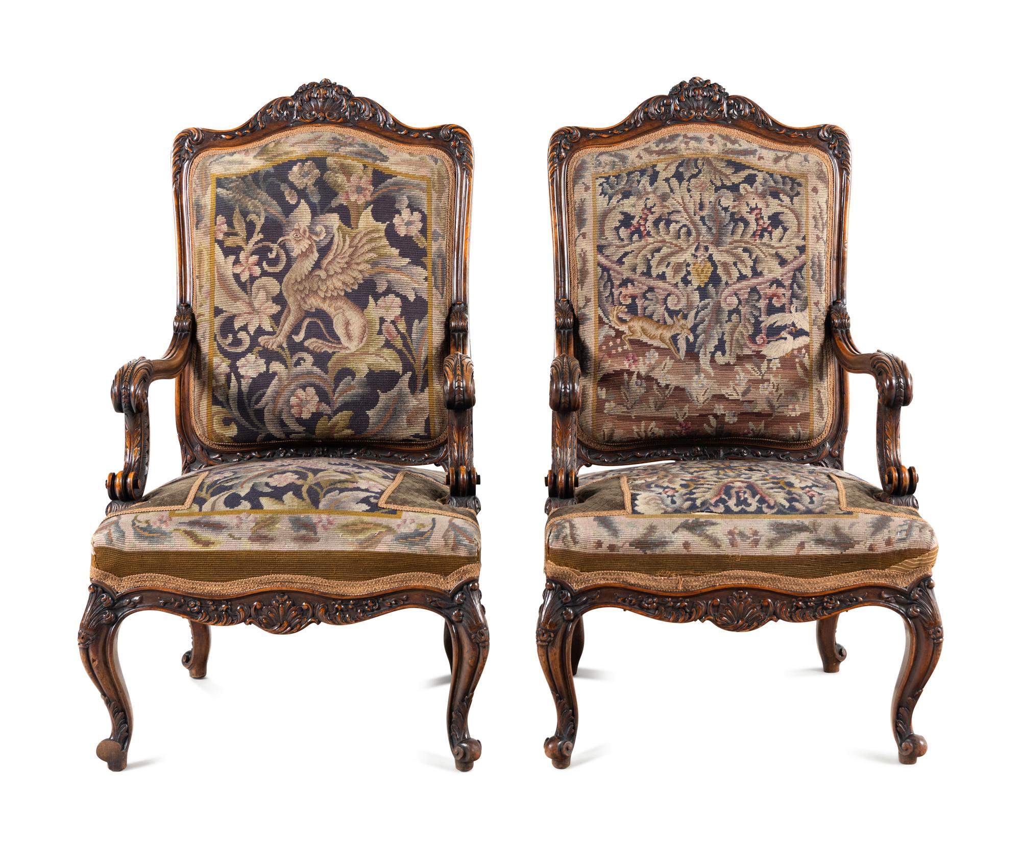 A Pair Louis XV Style Carved Walnut Fauteuils