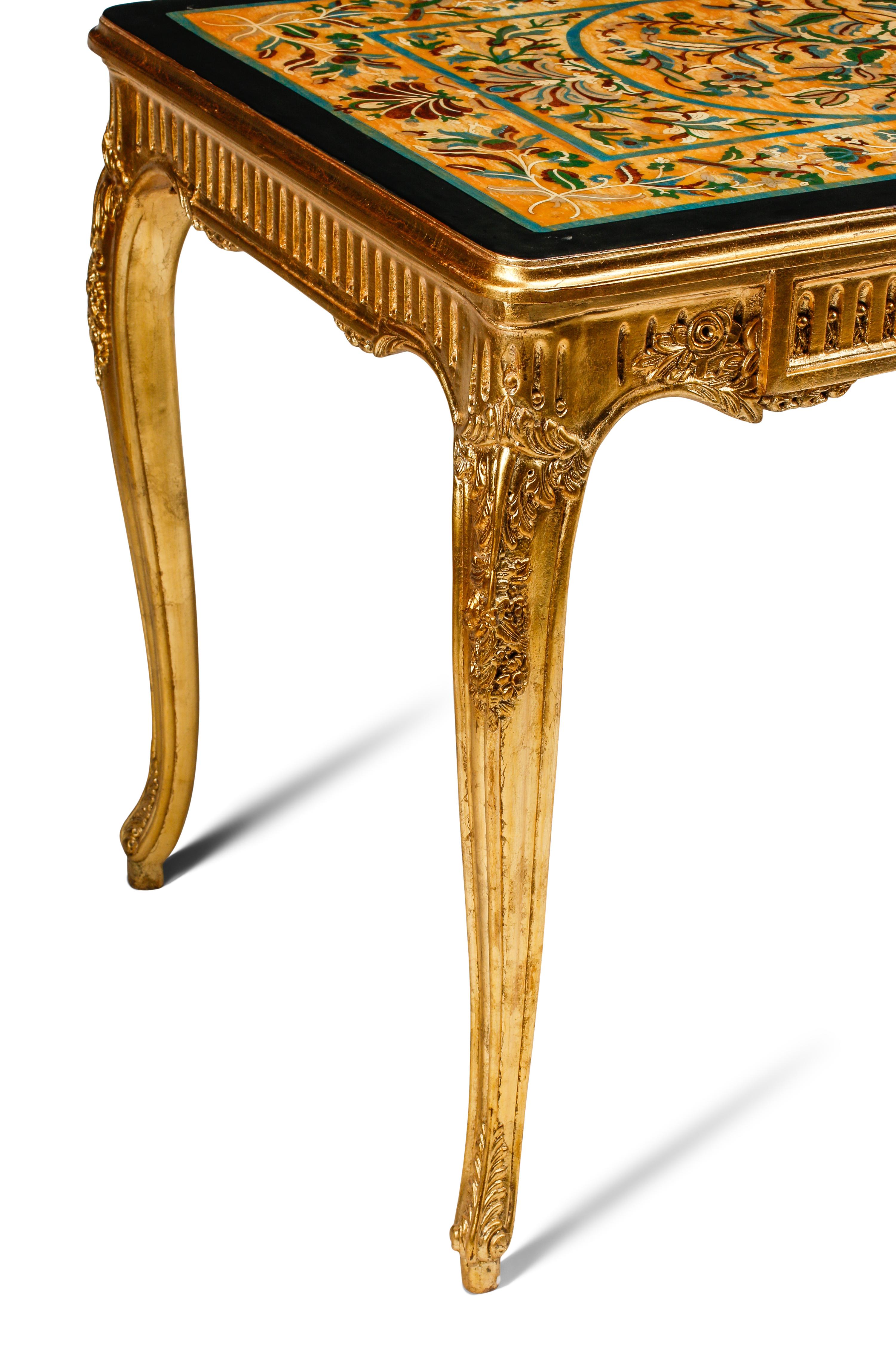 An Italian Giltwood and Scagliola Center Table