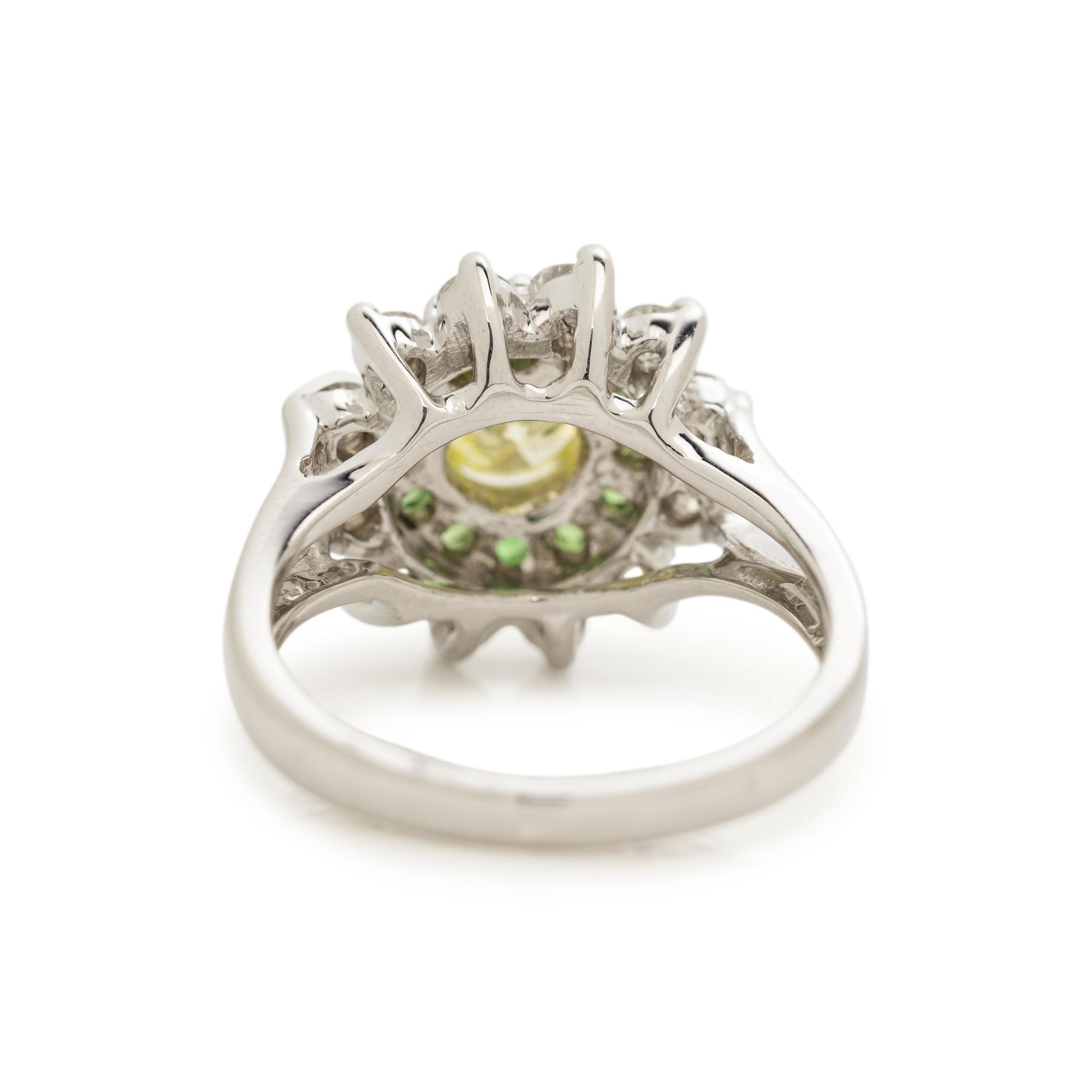 FANCY GREEN-YELLOW DIAMOND, TSAVORITE GARNET AND DIAMOND RING